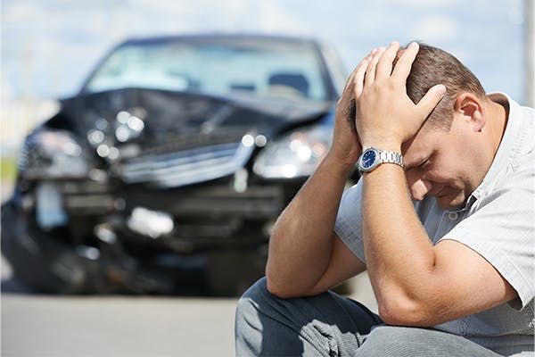 Adult-upset-driver-man-in-front-of-automobile-crash-car-collision-accident-in-city-road